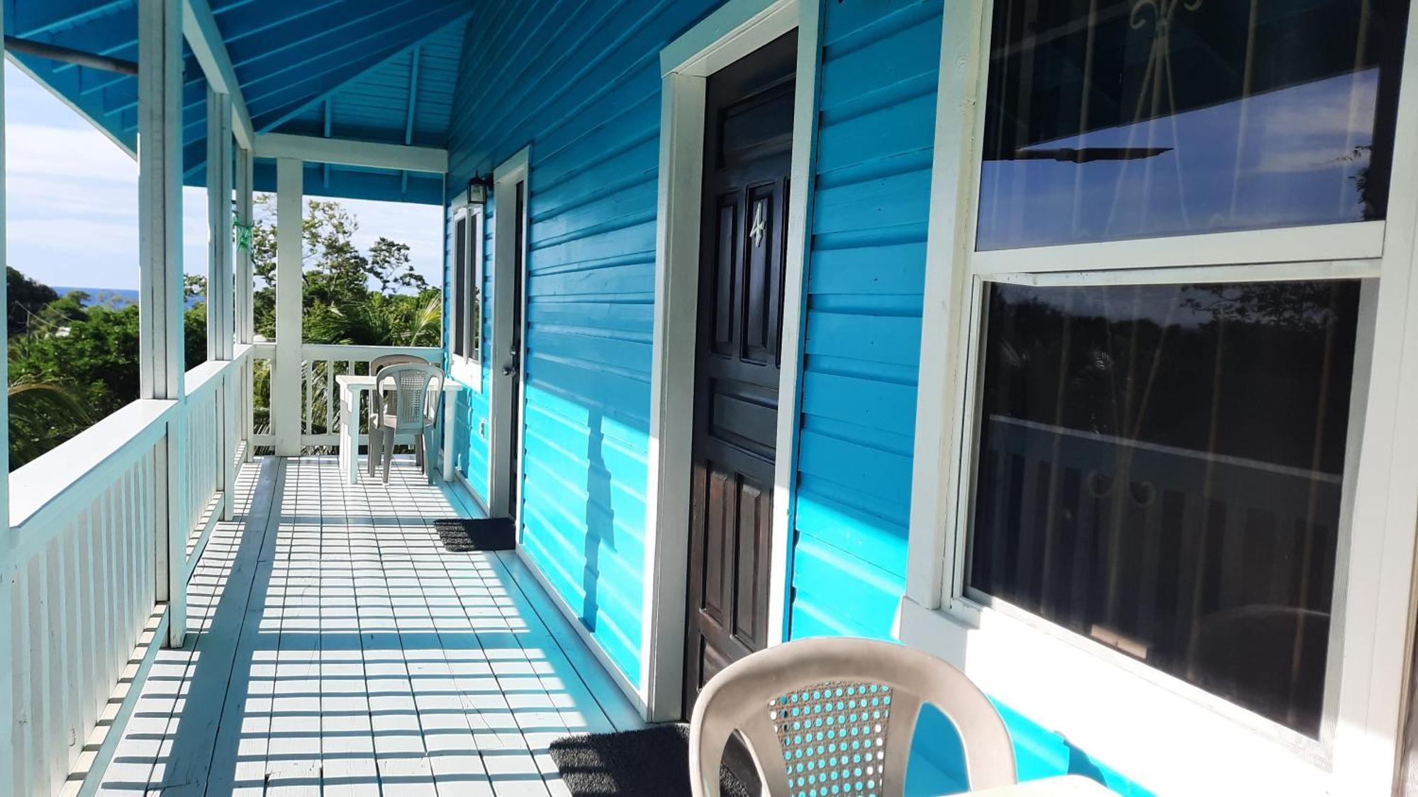 Guava Grove Resort & Villas Sandy Bay Rum bild